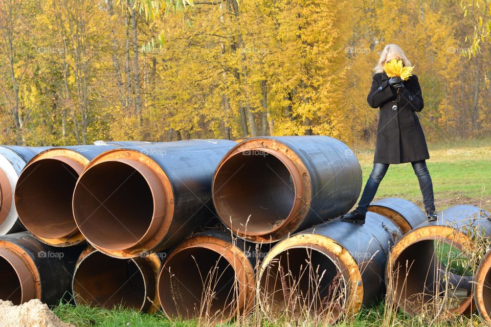 round tubes and woman autumn landscape