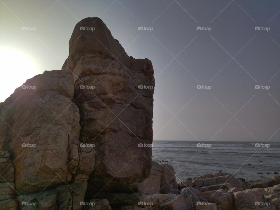 big rock in the beach