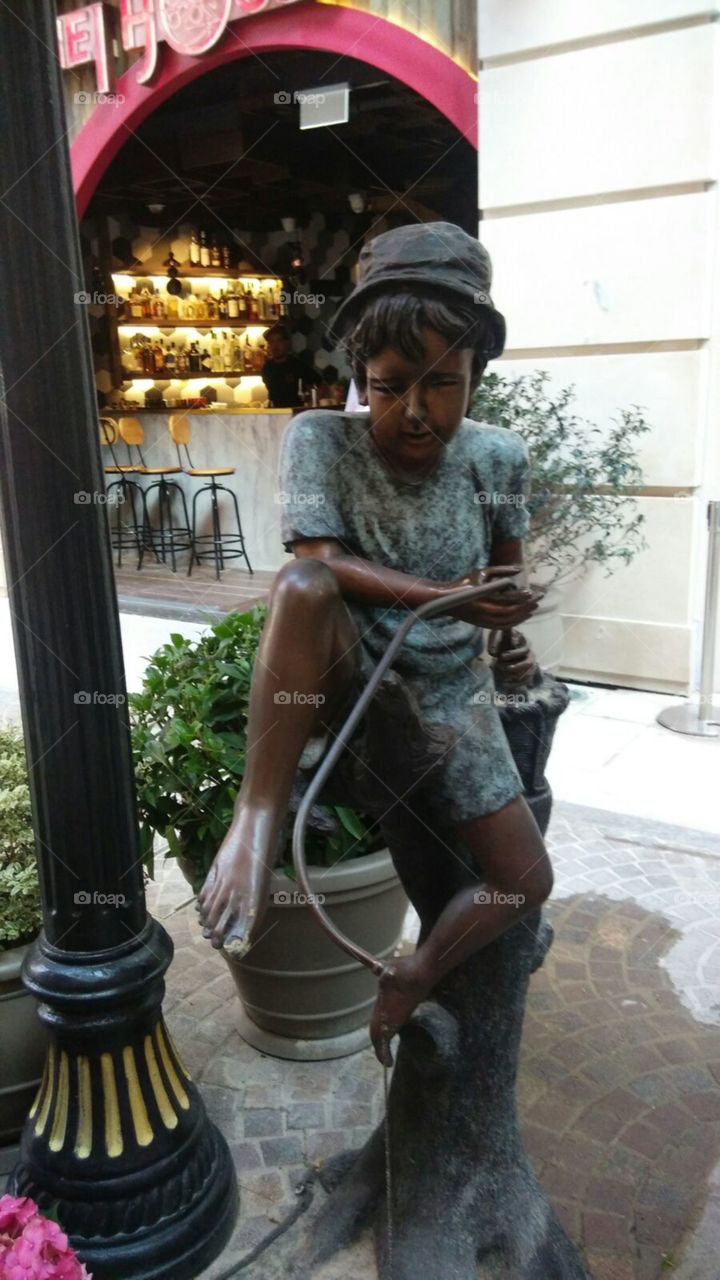 Watering Statue