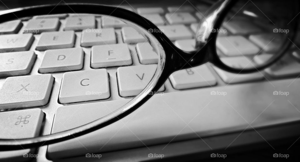Reading glasses on iMac keyboard