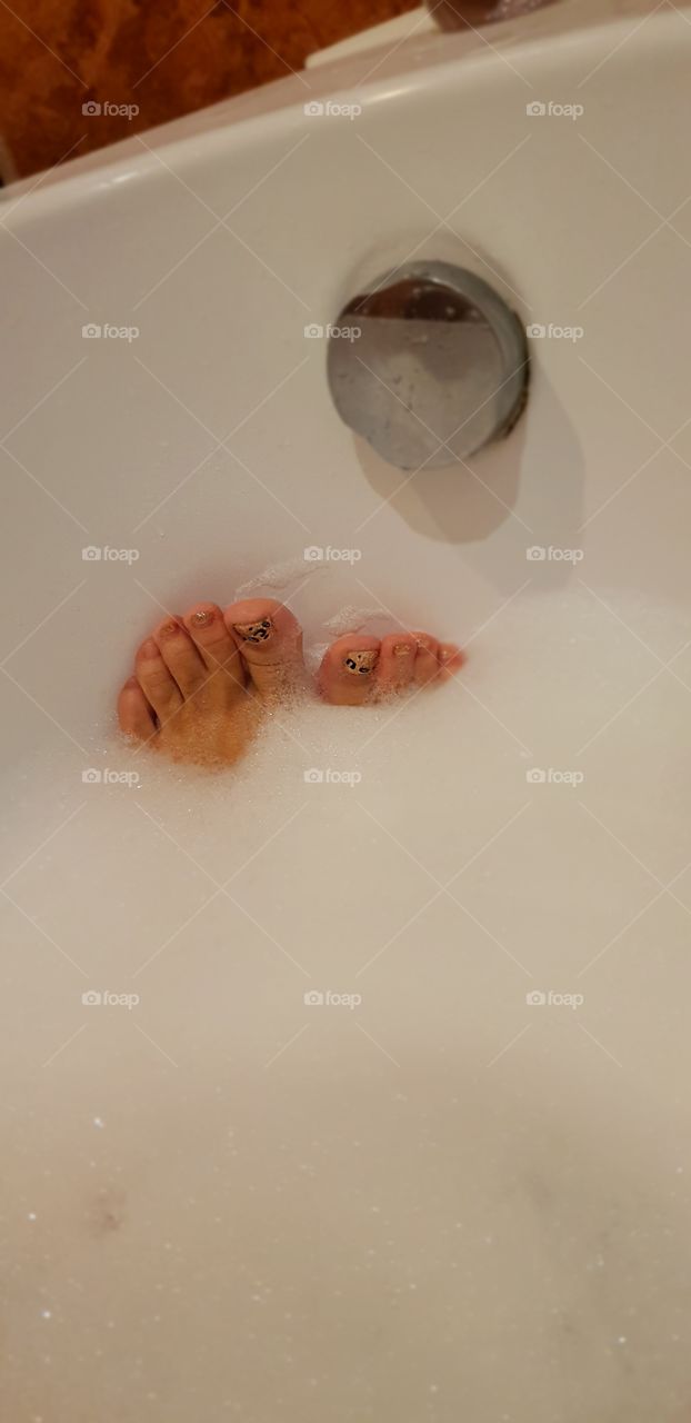 Feet in the foam