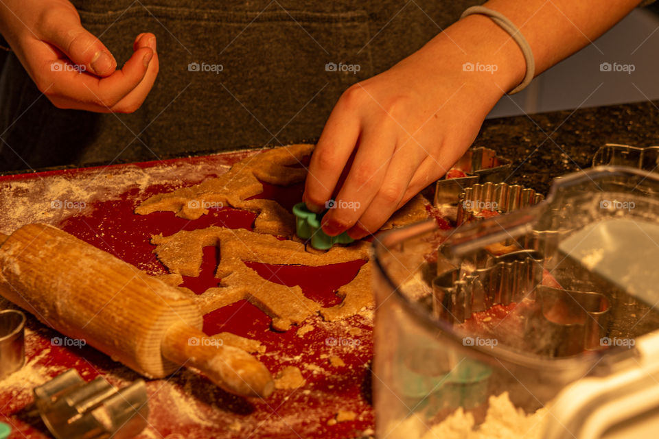 girl bakes christmas cookies