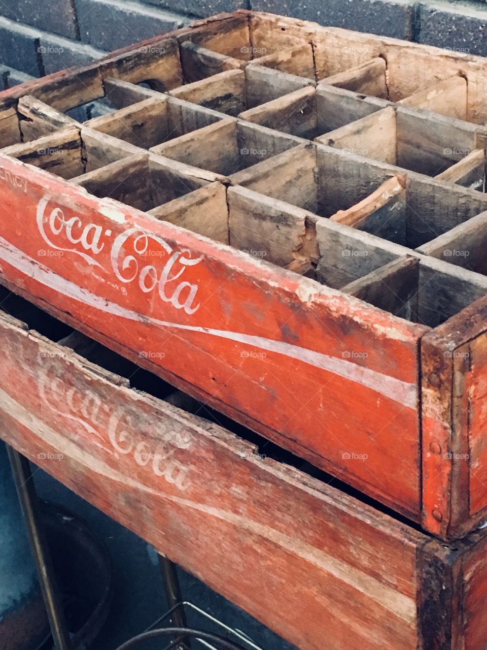 An old worn and antique wooden crate for bottles 