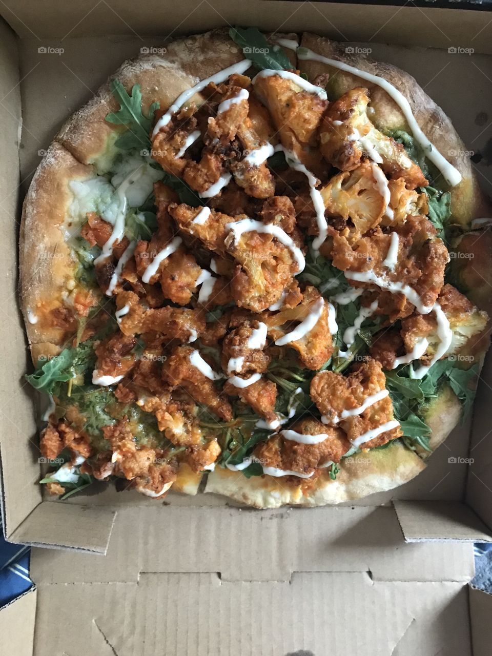 buffalo cauliflower pizza from Sage Vegan Bistro in Los Angeles, CA