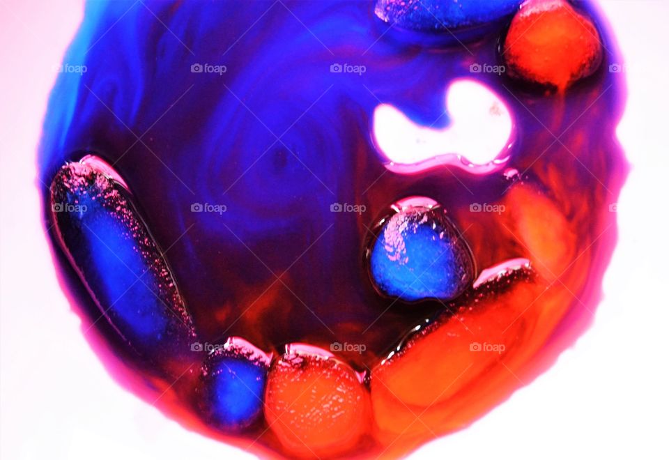 Melted colored ice cubes 