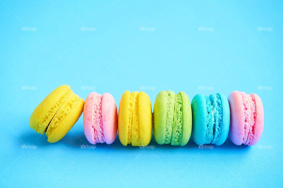 Macaroons on blue background 