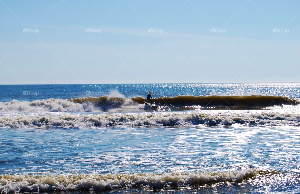 Surfer riding a wave