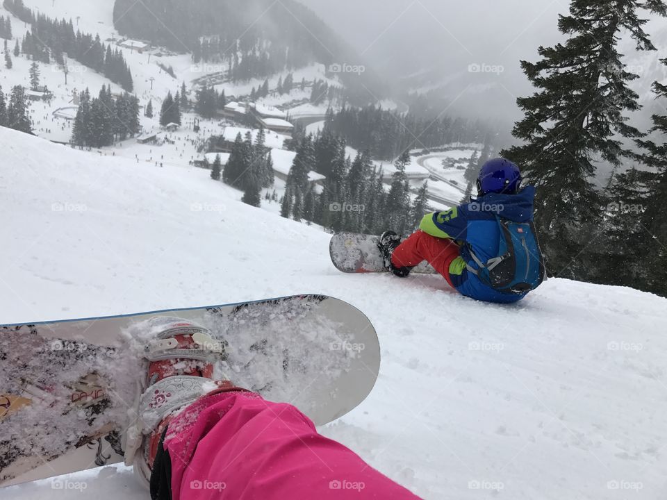 Snowboarding evergreen trees, snow mountain, Steven pass ski resort 