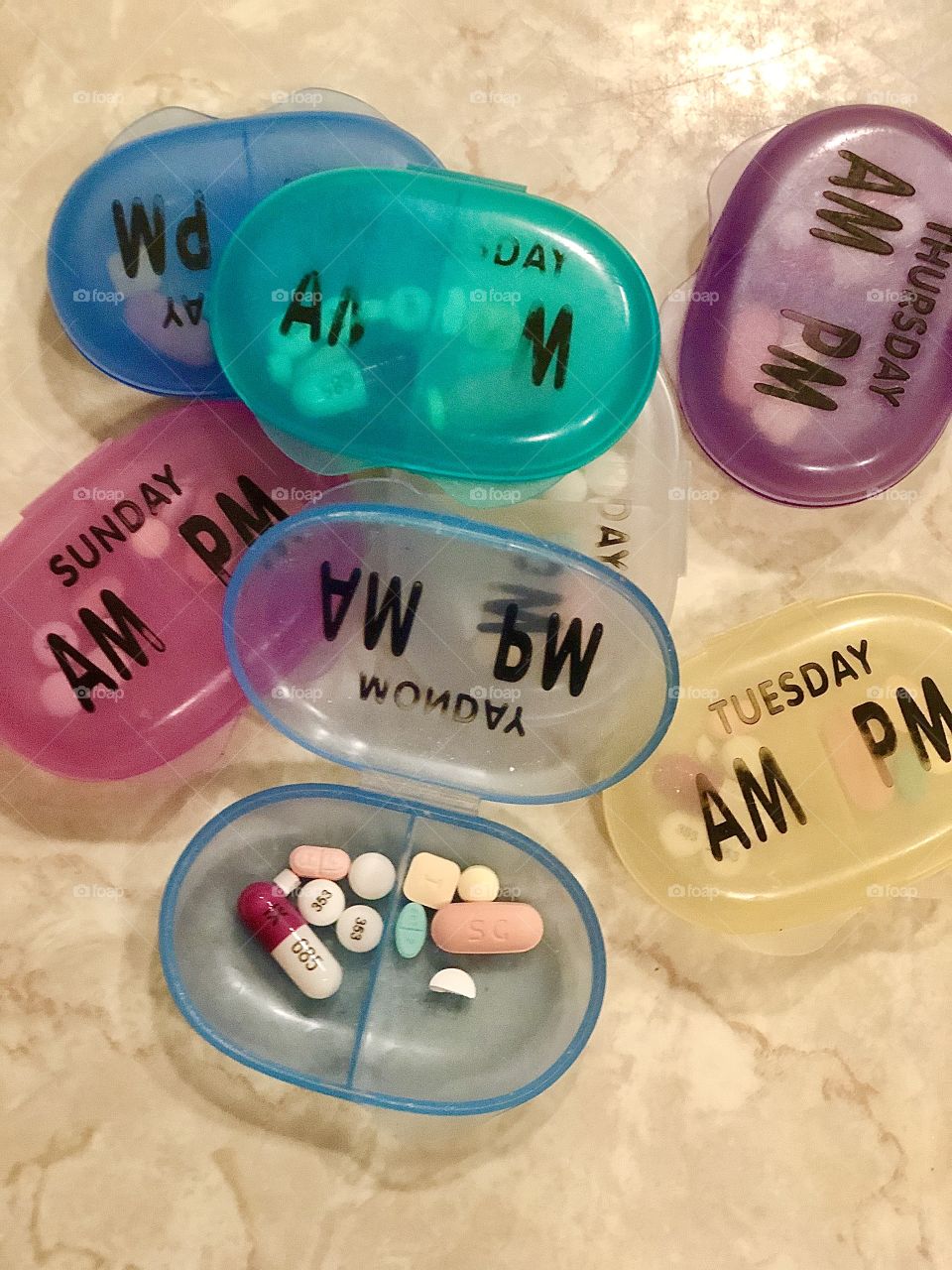  Maintenance medication for chronic illness organized into daily containers each week
