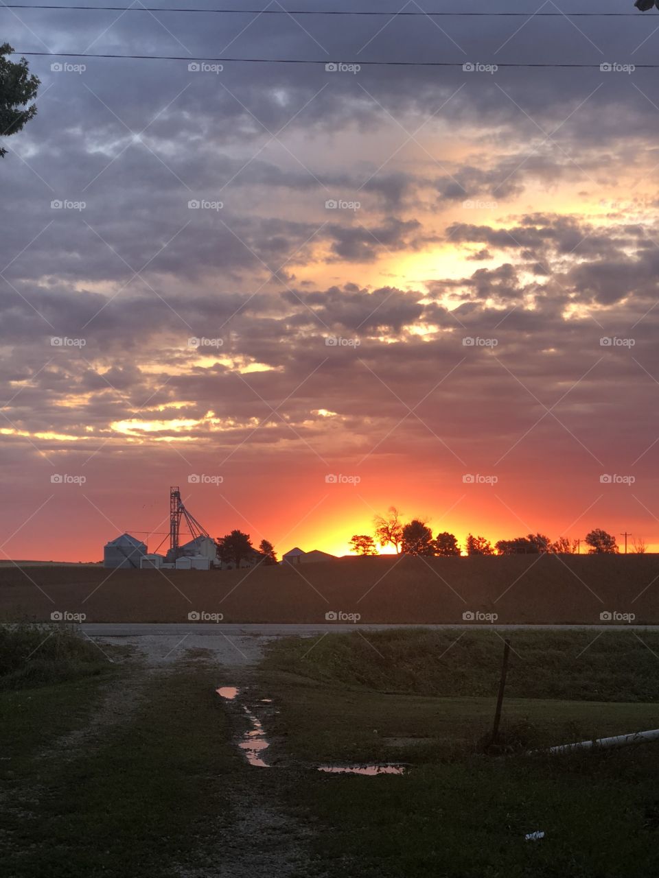 Early morning farm sunrise burning daybreak rural iowa