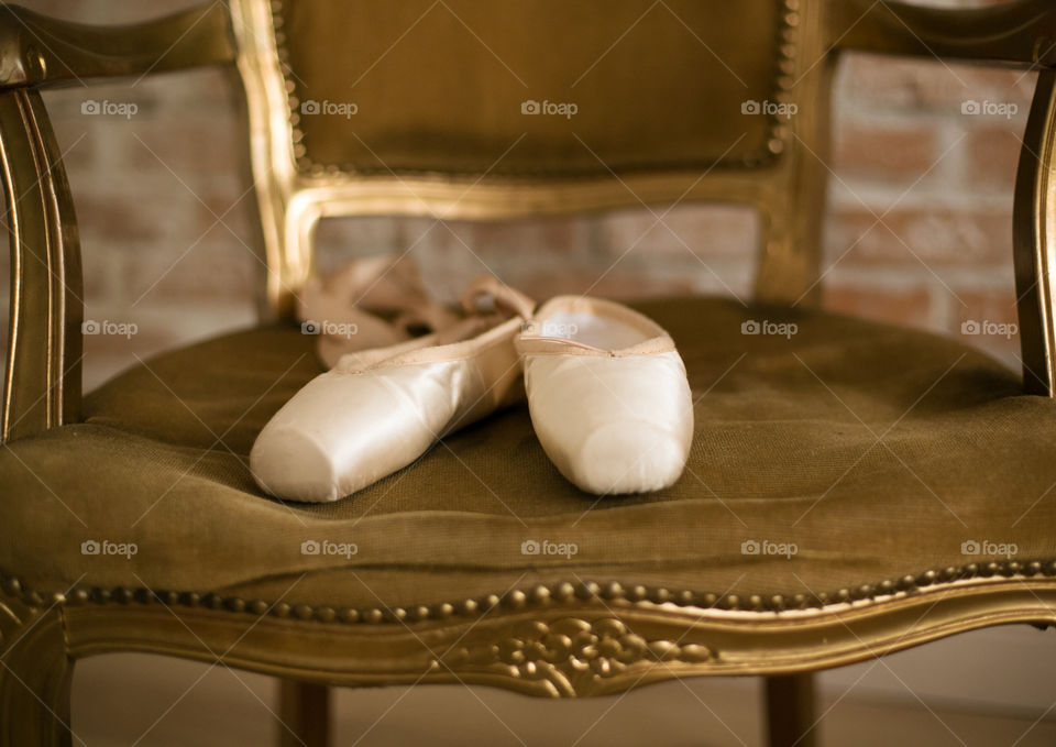 Ballerina shoes on chair