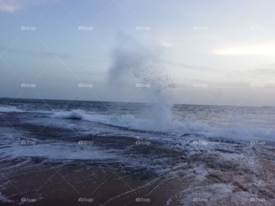 Sea water splashing on a evening
