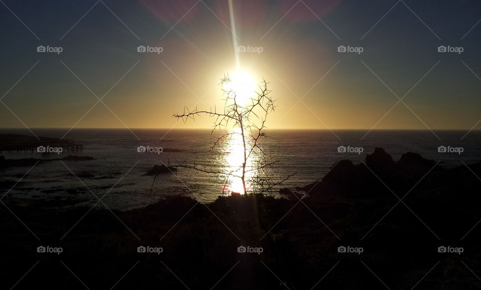 The sun sets in Doornbaai, South Africa on the west coast