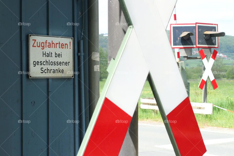 St. Andrew's cross in front of a railroad crossing 