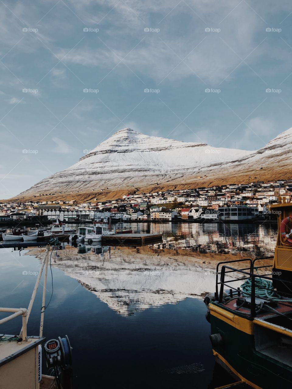 The top of the mountain with snow on the Faroe Islands 