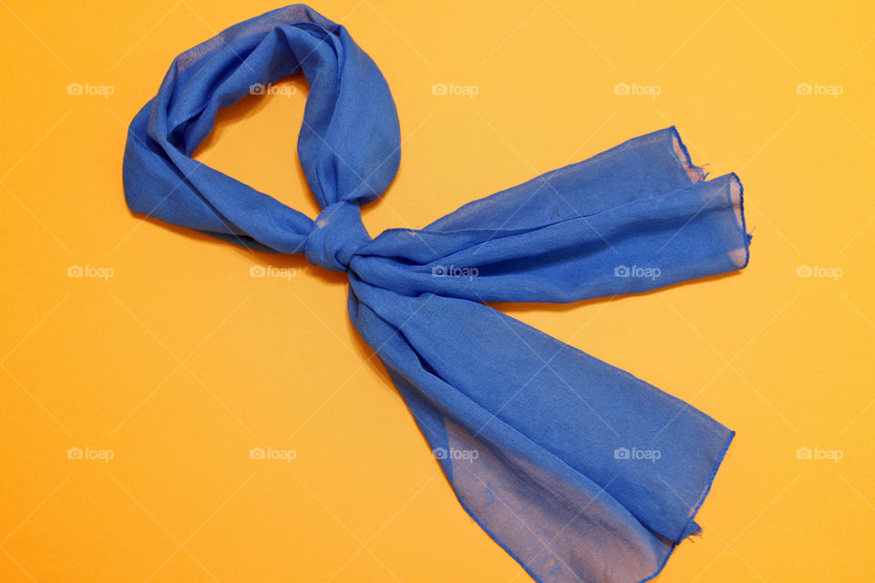 Blue scarf on the orange background