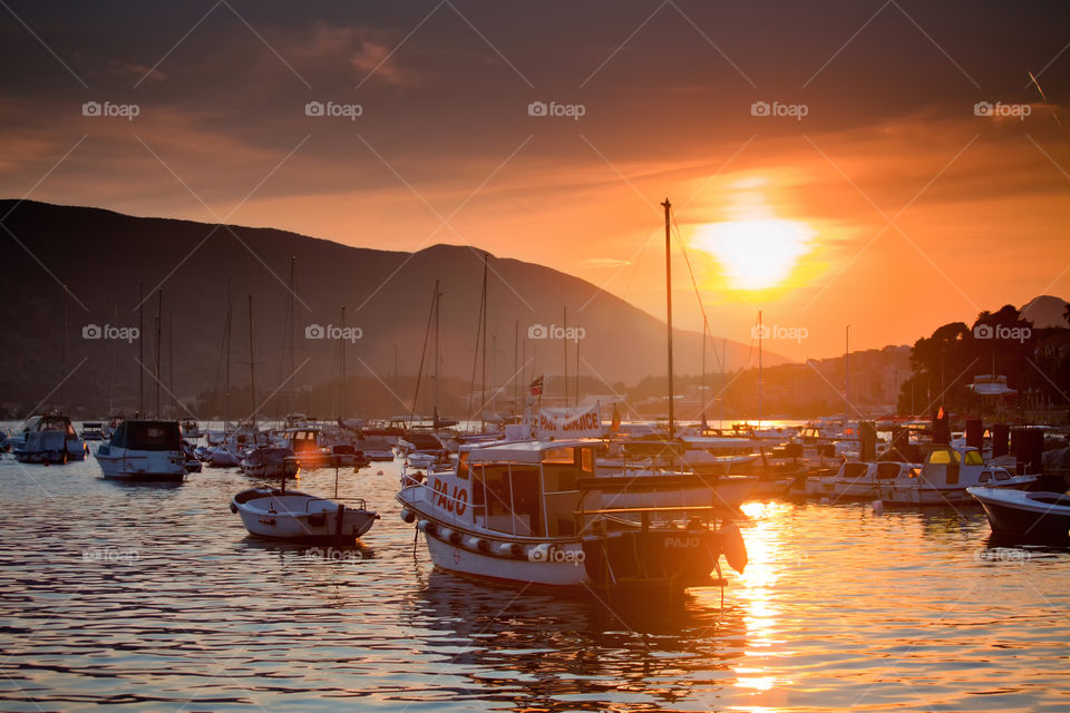 Yachts in Boko Kotor bay at Sunset. Herceg Novi, Montenegro