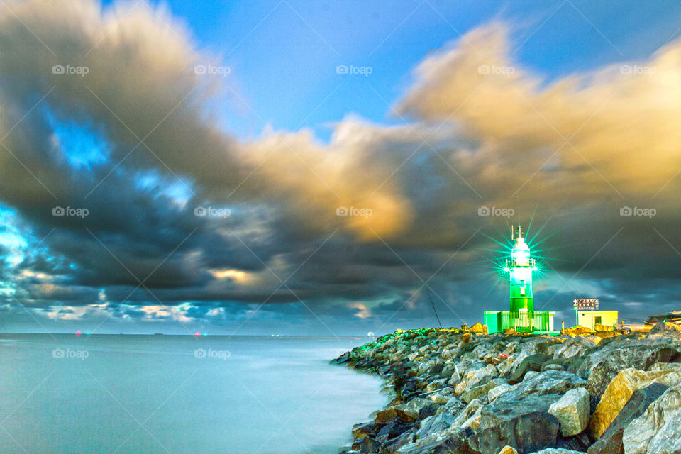 storm clouds over the south Mole lighthouse at Fremantle, Western Australia