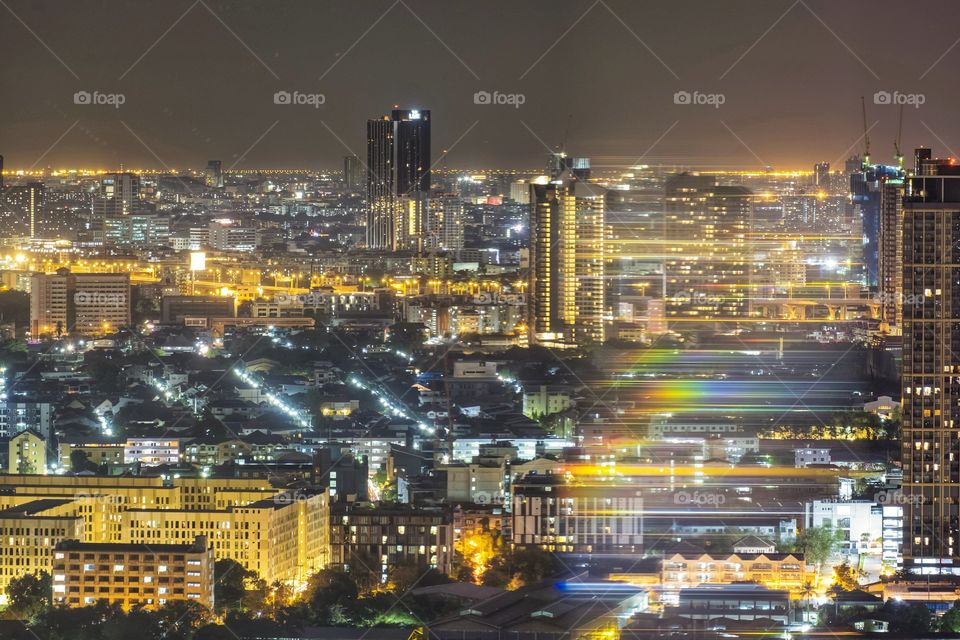 Night scene of skyscraper light and reflection in Bangkok Thailand