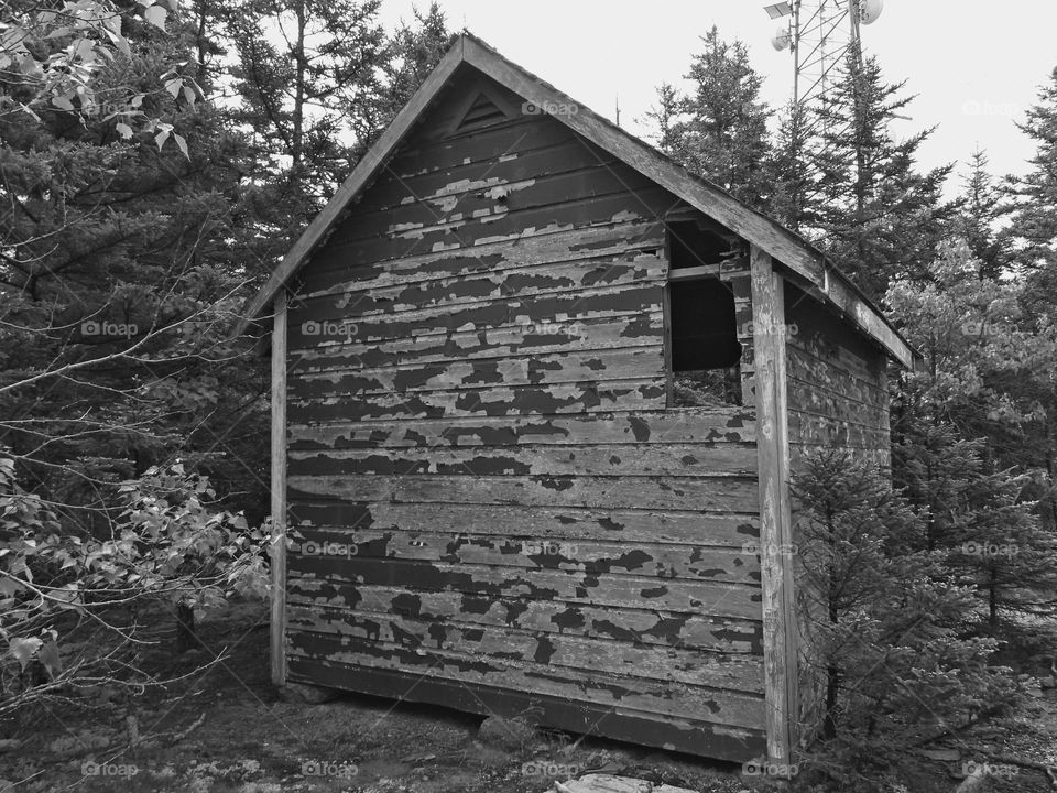 Vacation Series: Countryside - Weather worn abandoned building on top of the mountain