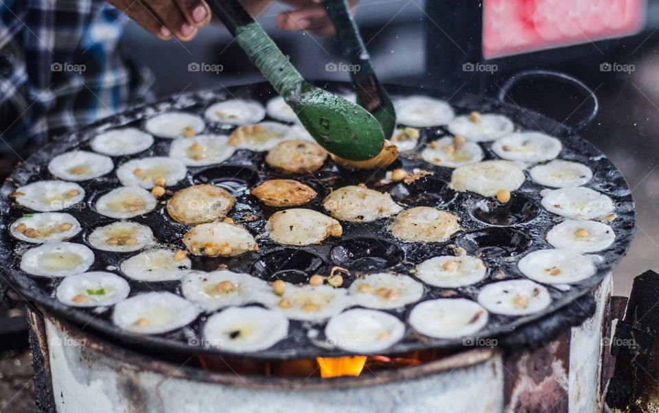 Street food at Yangon, Myanmar. Quail Egg Omelettes.
