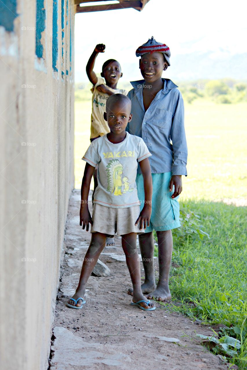 Boys Out Back. One of my favorite things about clinic days were seeing the children who came with friends or family and didn't have wrist bands on. No wrist band meant no seeing the Dr. Not seeing the Dr. Meant HEALTHY!