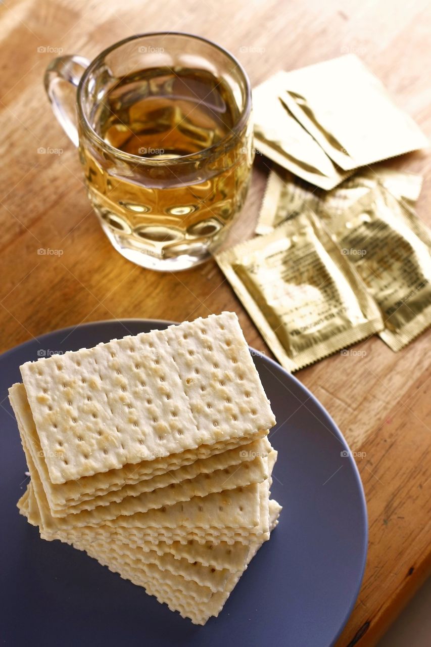 soda crackers and cup of tea