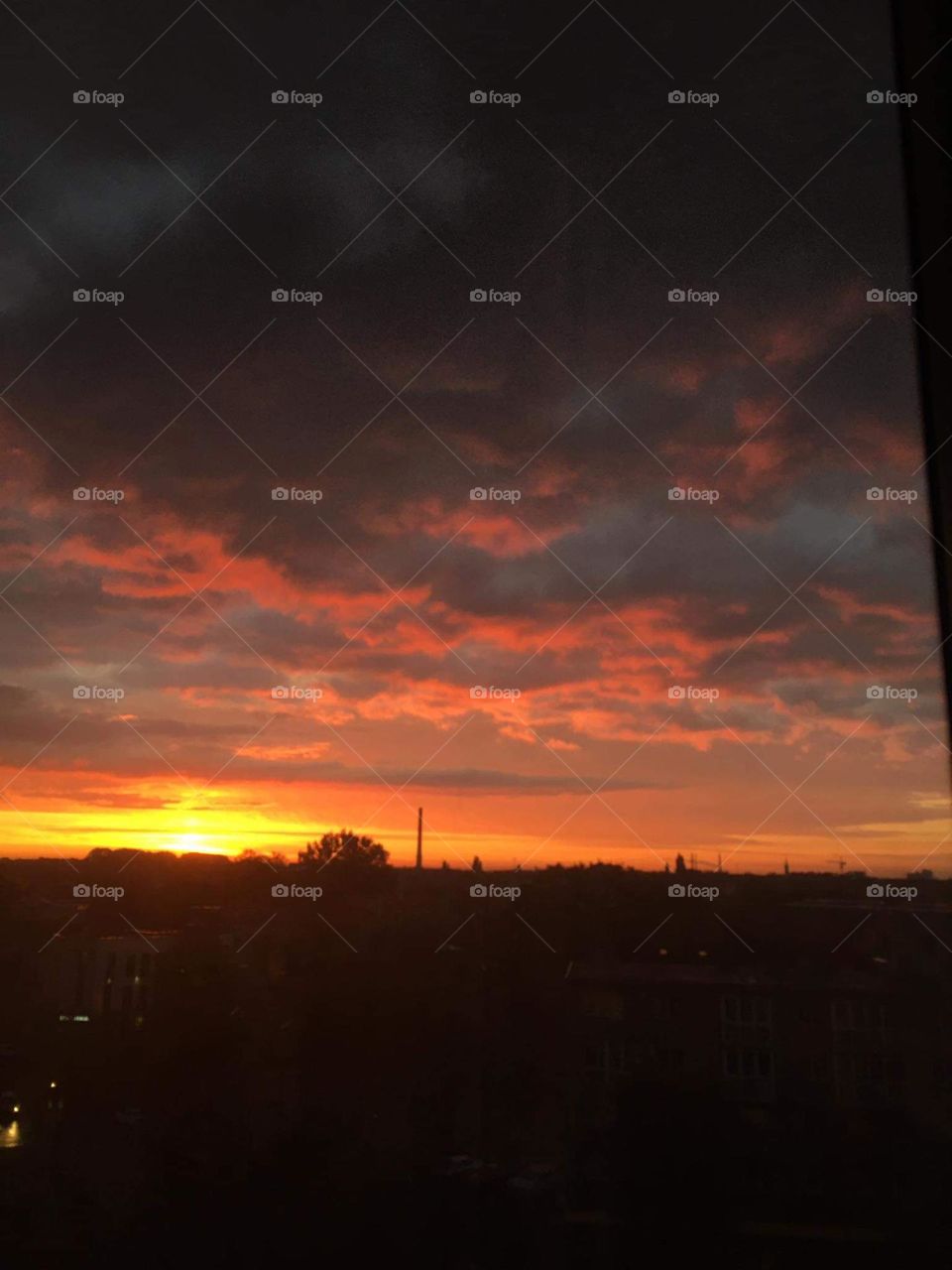 The sunset. The sky turned orange.