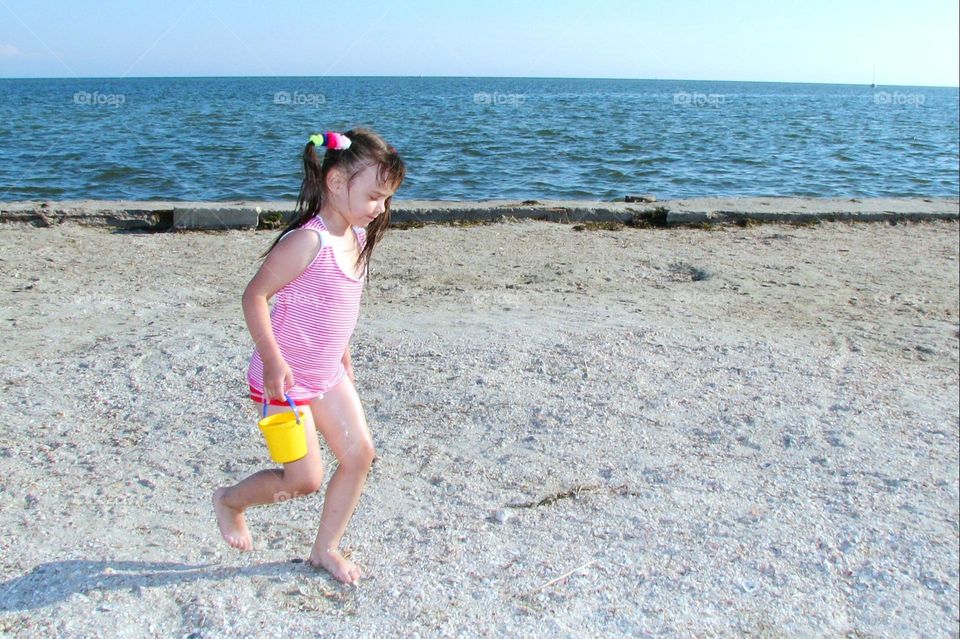 little girl on the beach