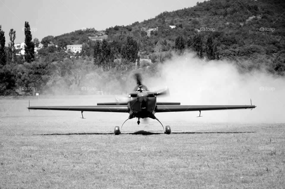 Sports plane landed on the meadow