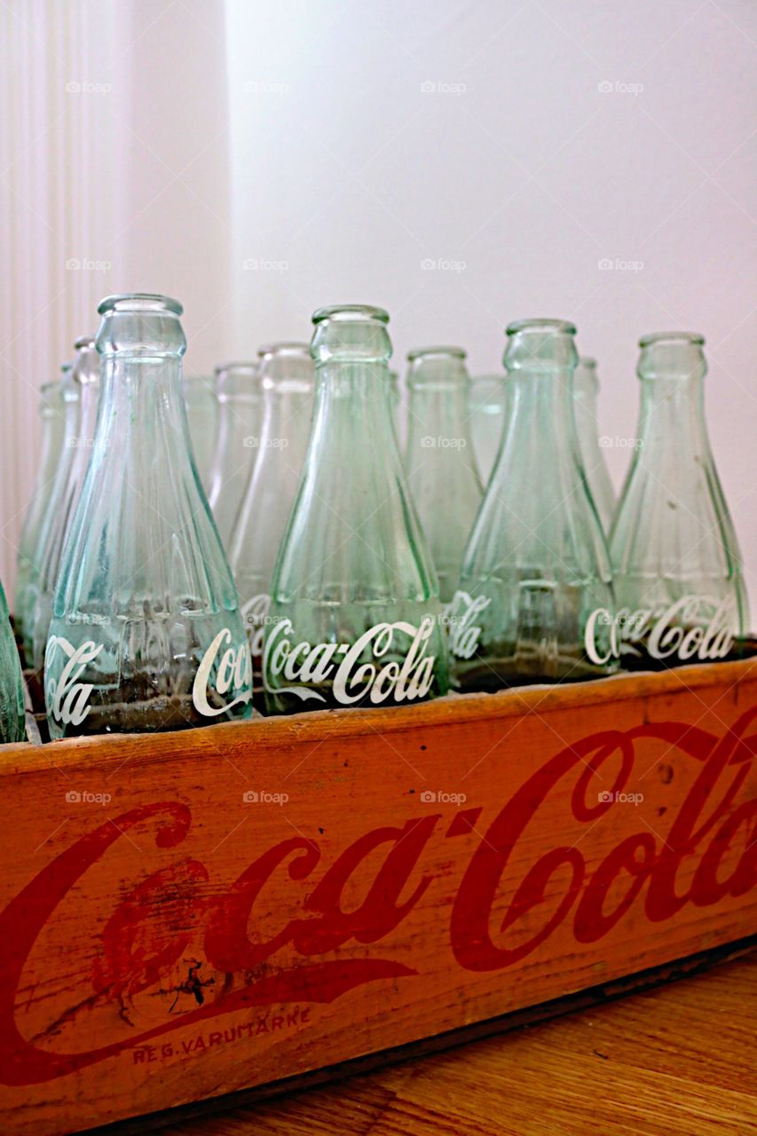 Coca cola bottles in a wooden box!