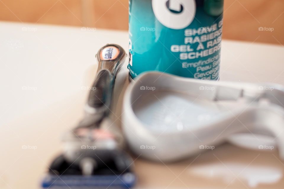 Shaving cream and razor blade