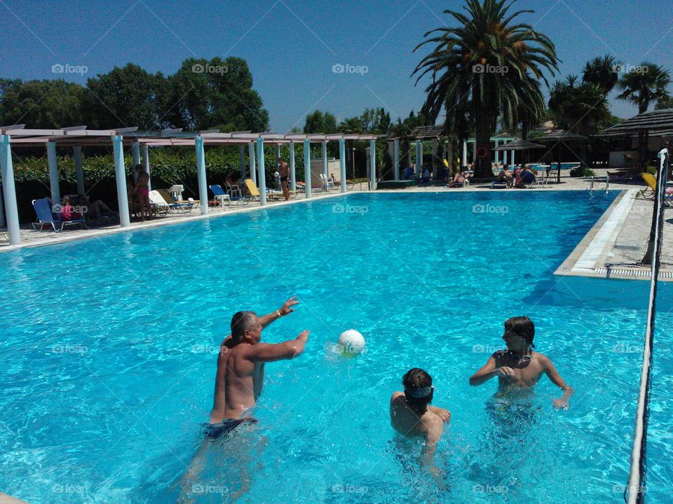 People enjoying in swimming pool