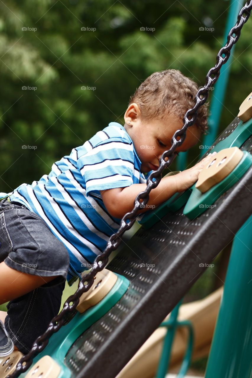 KID ON THE PLAYGROUND