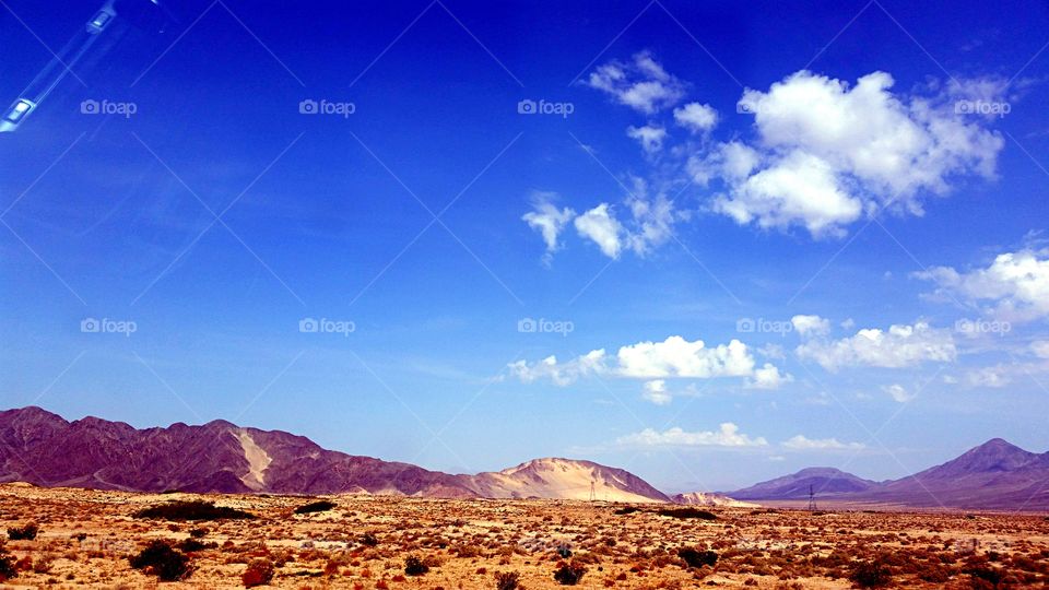 Mountains against blue sky