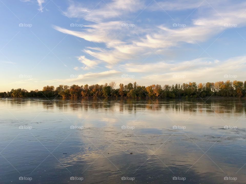 Evening on the edge of the river at autumn.