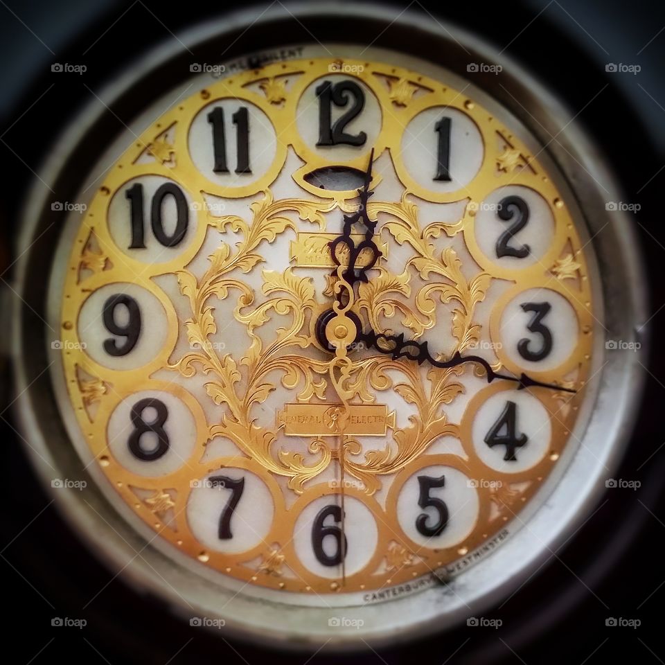 Antique clock golden clock face