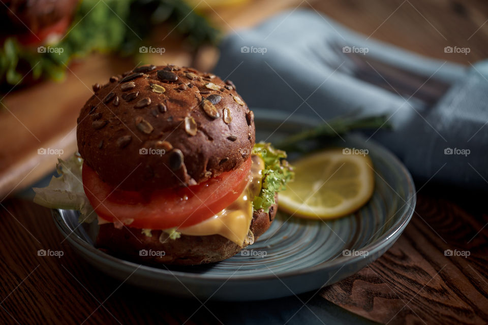 Dark burger with grain bread