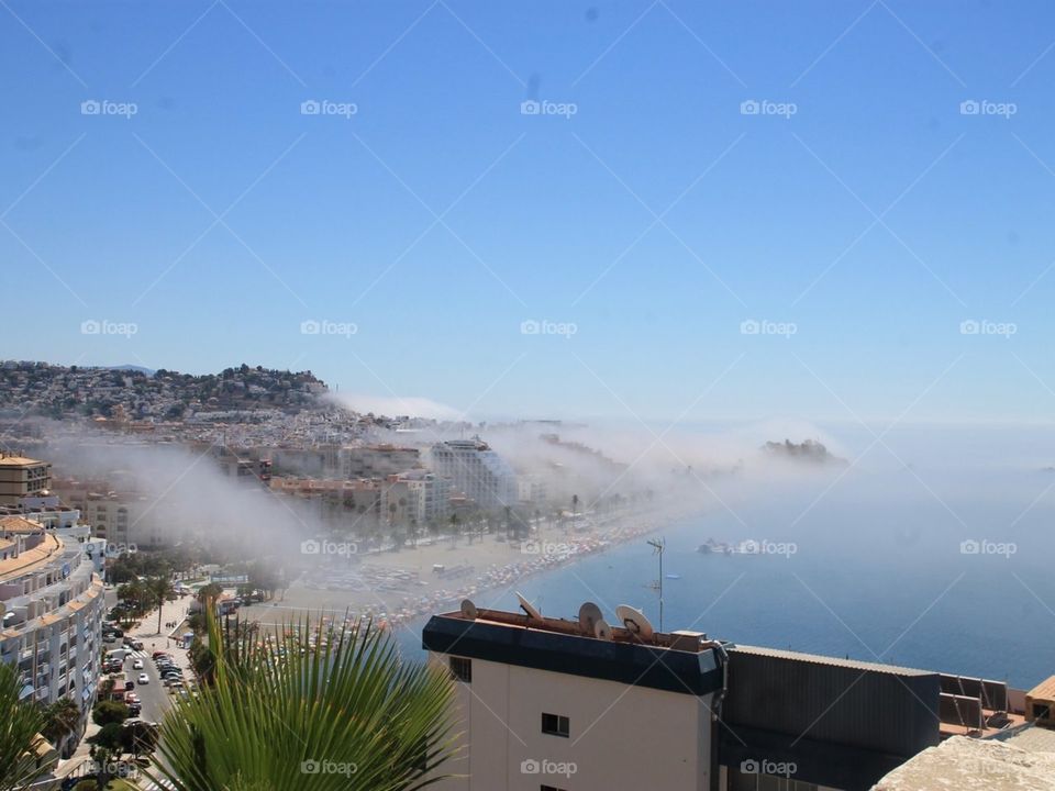 Fogwaves hit the coast. Almuñecar, Spain