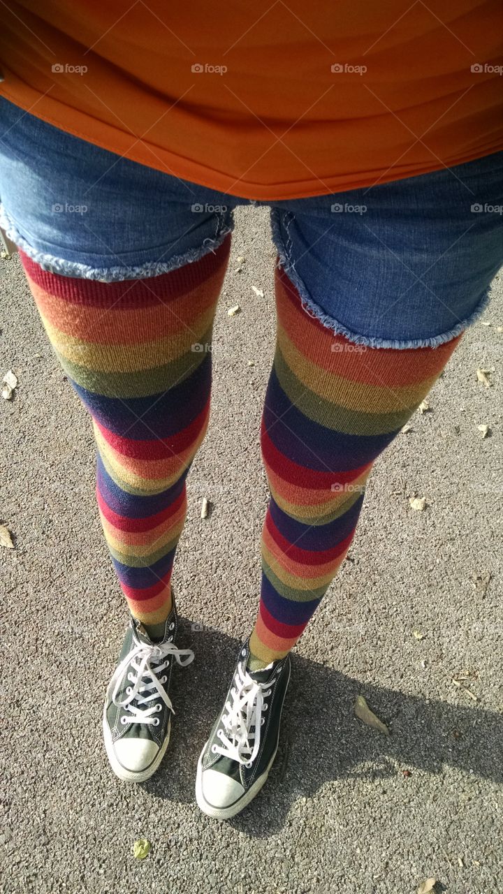 Rainbow striped tall socks.