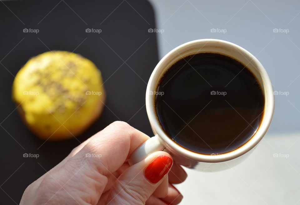 cup of coffee in the hand, drinking coffee, good morning