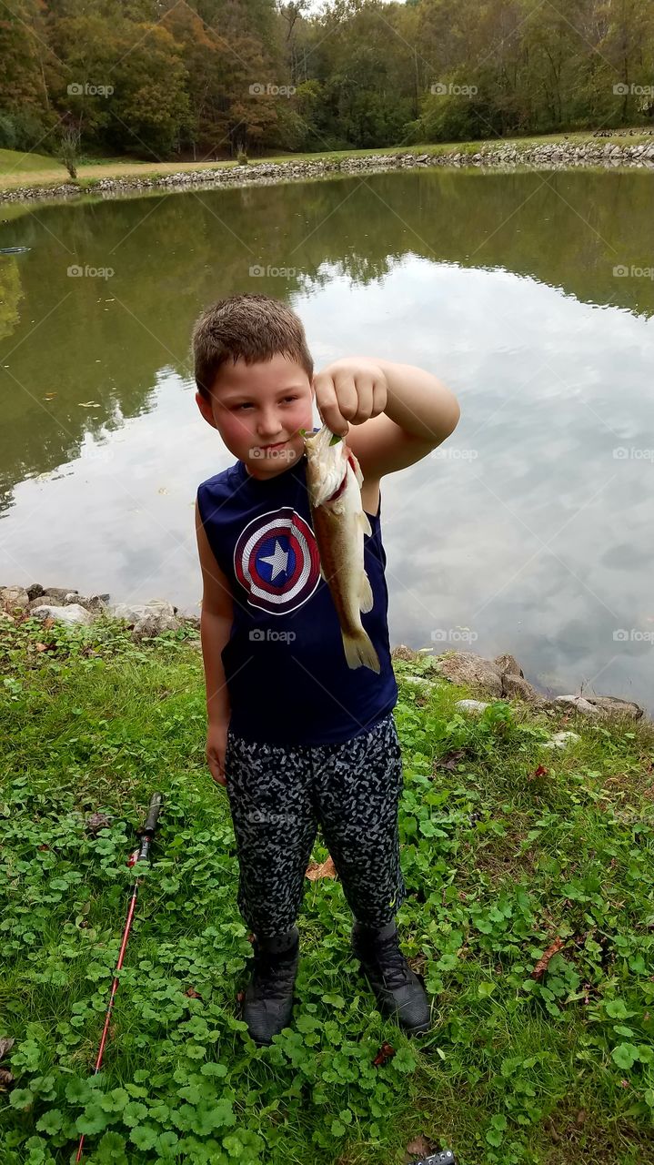 my boy catching a fish