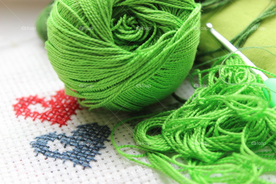 Ball of wool and knitting needle
