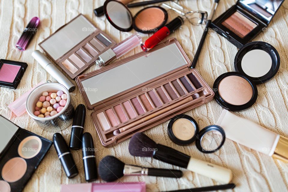 Makeup products flat lay 