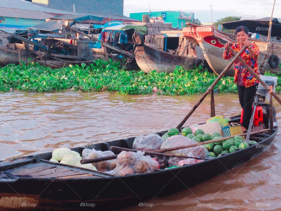 Market on boat at Can Tho Province (Vietnam)