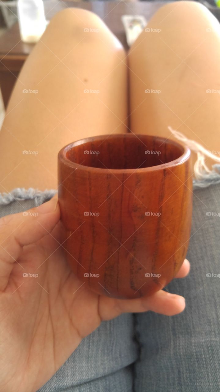 Wooden mug with wine