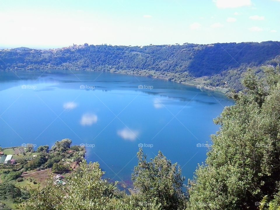 nemi's lake. the blue water of a little lake