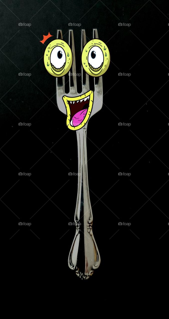 Happy baby fork with emoji eyes and open mouth to cheer baby up as he eats