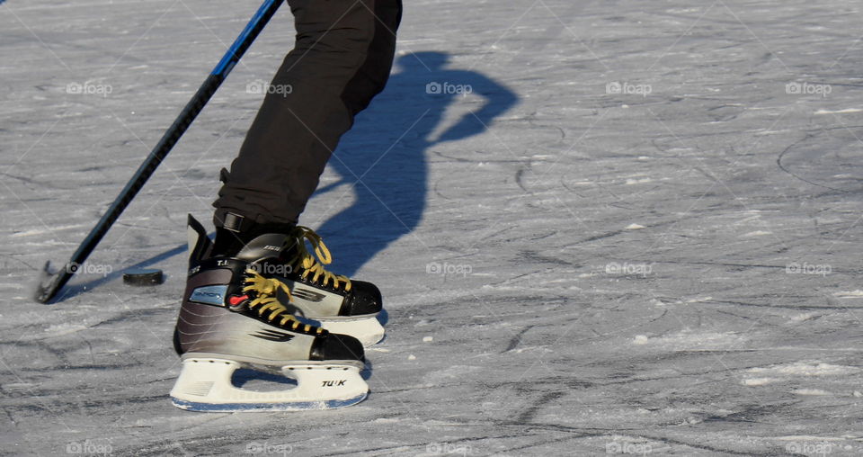 Ice hockey shadow.