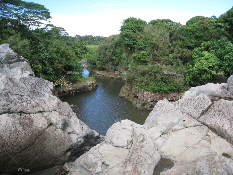 top of waterfall. climbed on rock to waterfall